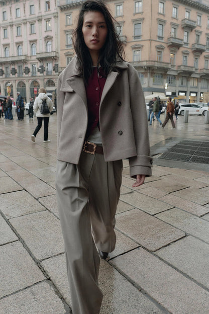 Bunda s vysokým límcem